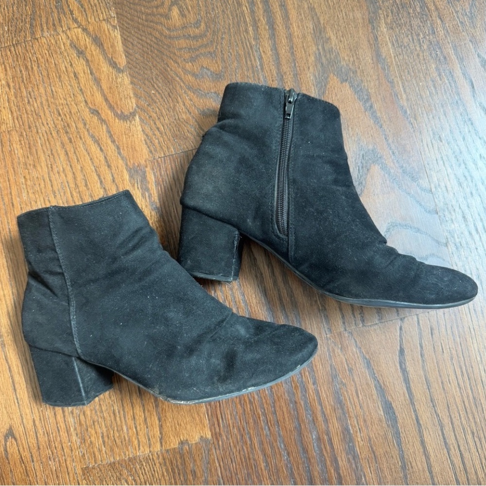 Well worn but still functional flight attendant winter Ankle Boots